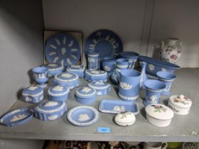 A collection of Wedgwood light blue Jasper wares to include a boxed Elizabeth II commemorative