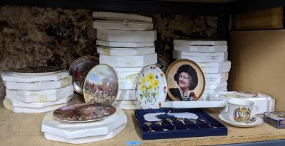 A selection of collectors plates depicting hunting scenes, flowers and the Queen Mother and other