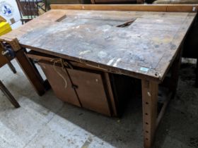 A mid century teak work bench with attached vice and cupboard underneath 89x157.5x77cms Location: If