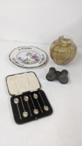 A set of six silver coffee spoons, a Mdina vase, opera glasses and a plate Location: If there is