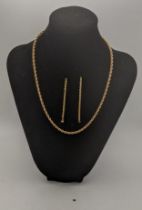 A 9ct gold rope link necklace and a pair of matching earrings 5g Location: If there is no