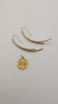 A Chinese gold pendant 1.9g and a pair of Italian 9ct gold earrings 1.45g Location: If there is no