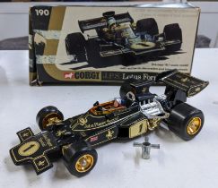 A Diecast 18:1 Scale JPS Lotus Formula 1 by Corgi Toys No.190 with original box and wheel key
