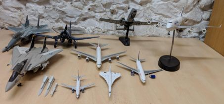 Nine aircrafts - Four military planes to include a Tamiya 1/48 plastic model kit Grumman F-14A