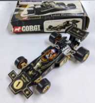 A Diecast 18:1 Scale JPS Lotus Formula 1 by Corgi Toys No.190 with original box, but without wheel