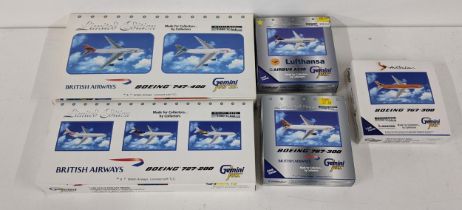 Five boxed containing eight models of commercial aircrafts by Gemini Jets to include a Boeing 727-
