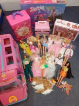 Barbie-A quantity of boxed 1990's Barbie collectables to include a weekend camping set, a camper