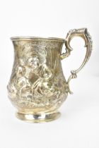 A Victorian silver mug, by Robert Harper, hallmarked London 1857, the embossed baluster formed