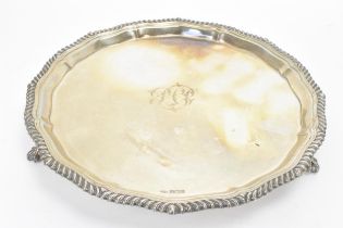 An Edwardian silver salver, by Mappin & Webb, hallmarked Sheffield 1906, having a gadrooned rim,