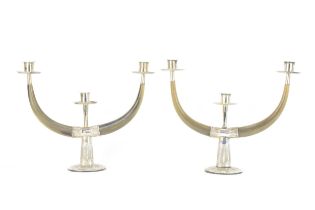 A pair of early 20th century Malaysian silver and horn mounted candelabras, the sconces, mounts