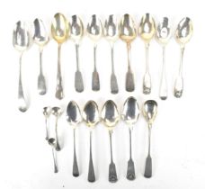 A selection of mainly Georgian silver spoons to include a set of four George III fiddle pattern
