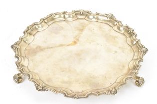 A George V silver salver by Adie Brothers, hallmarked Birmingham 1931, having a Chippendale rim with