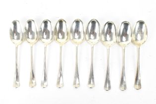 A set of nine George VI silver dessert spoons, hallmarked London 1936, the bowls with rat tail to