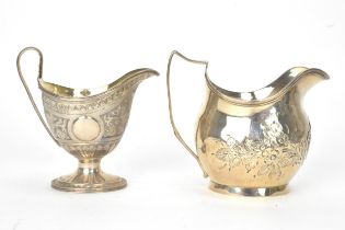 A George III silver milk jug hallmarked London 1810, together with a Victorian silver cream jug