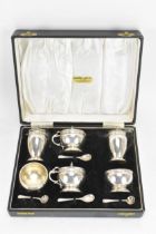 A George VI silver cased cruet set by Charles S Green & Co Ltd, hallmarked Birmingham 1948,