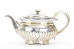 A George III silver teapot, by Alice & George Burrows II, hallmarked London 1814, having a reeded