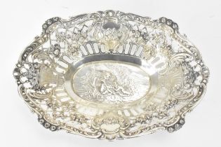 A 19th century continental silver dish, stamped J.B 800, profusely decorated and pierced with