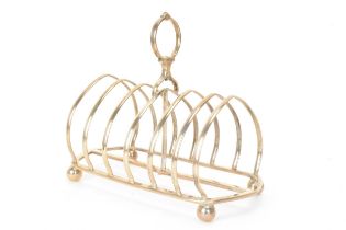 A Victorian silver toast rack, makers marks possibly for Jane Brownett, hallmarked London 1880, with