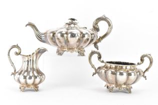 A 19th century matched Irish silver tea set comprising a teapot by Patrick Loughlin, hallmarked