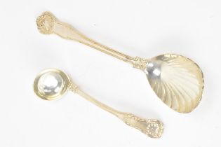 A Victorian silver serving spoon hallmarked London 1892, together with a silver ladle hallmarked