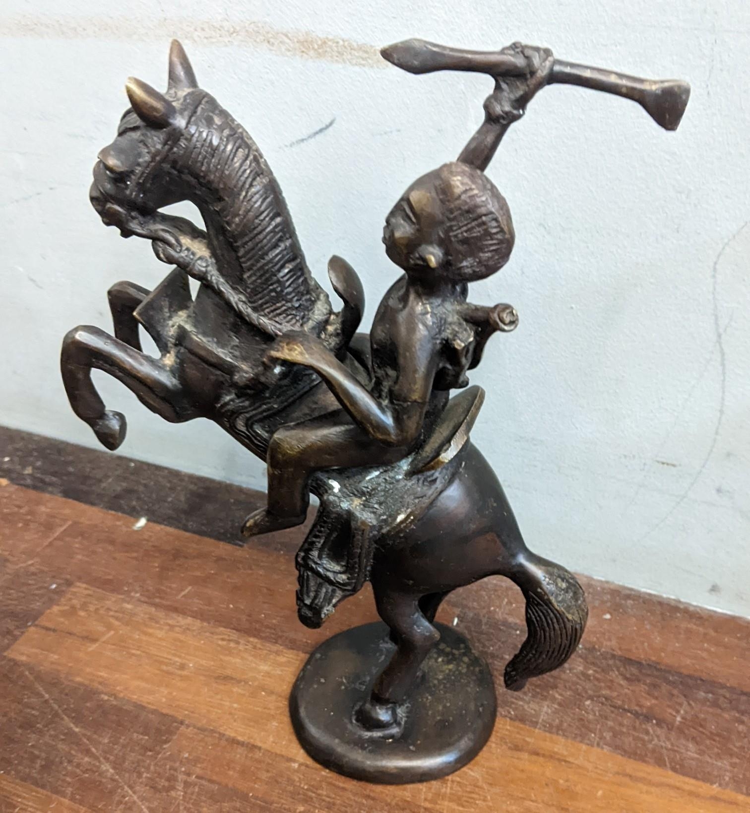 An African brass sculpture of a horse warrior, a vintage bronze horse, a scotty dog figurine and a - Image 3 of 3