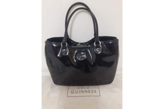 Lulu Guinness- A large black patent handbag 40cm wide x 30cm high having silver tone hardware and - Image 1 of 9