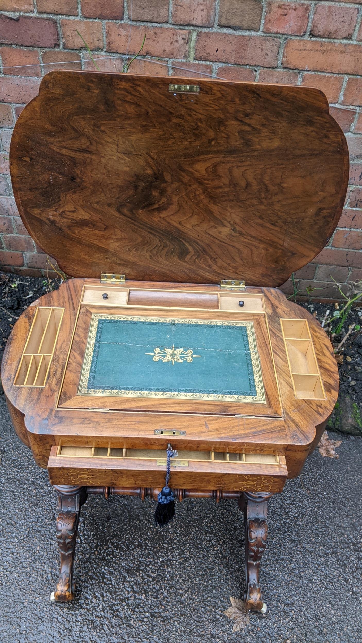 A Victorian walnut work table having marquetry inlaid hinged top with a fitted interior and drawer - Image 2 of 3