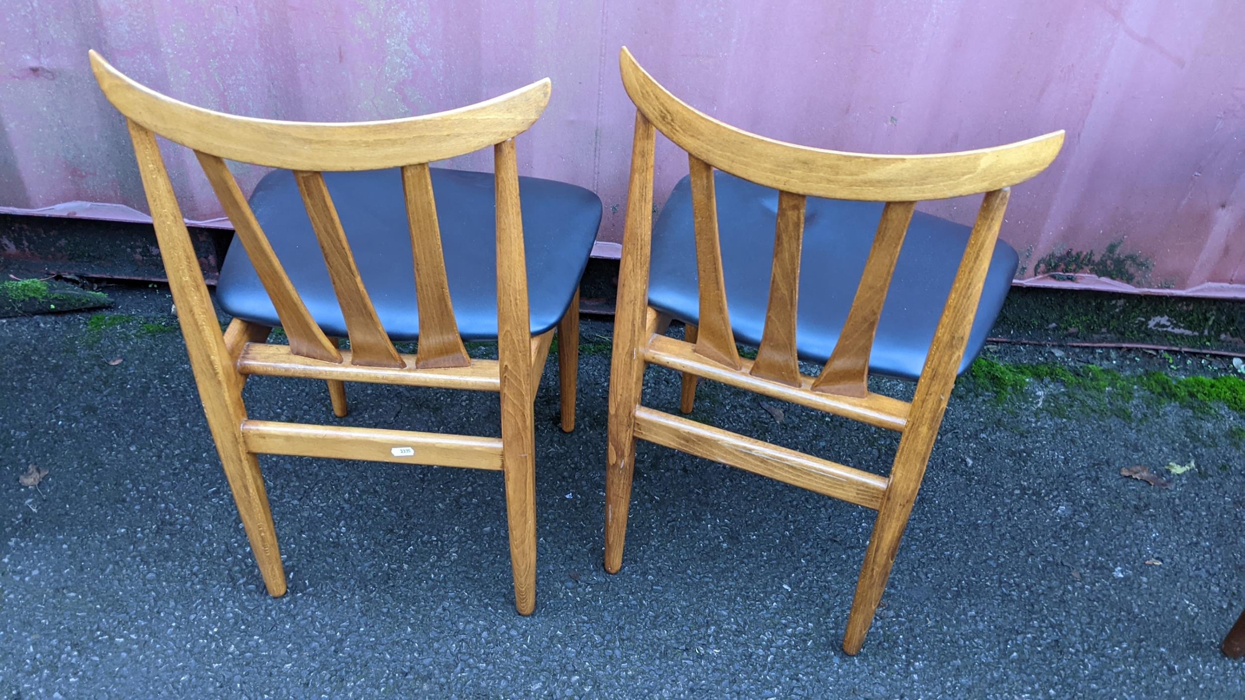 A mid 20th century retro teak extending dining table together with six teak dining chairs, the table - Image 10 of 10