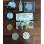 A Continental silver fob watch, a plated Hunter watch, coins, a scent bottle and other items