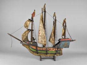 A Mid/Late 20th Century Wooden Model of a Four Mast Ship, Condition Issues, 62cms Wide