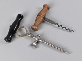 An Early 20th Century Champagne Tap with Ebonized Handle together with a Vintage Corkscrew