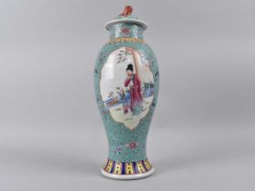 A Chinese Porcelain Enamel Baluster Vase and Cover Decorated with Cartouche Scene depicting Child