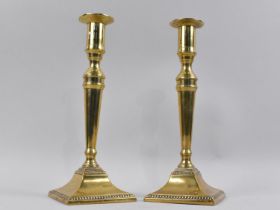 A Pair of 19th Century Brass Candlesticks on Square Tapering Bases, 25cms High