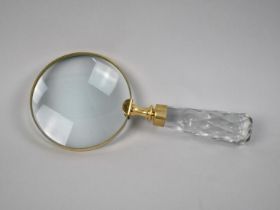 A Large Desk Top Brass Mounted and Faceted Glass Handled Magnifying Glass, 22cms Long