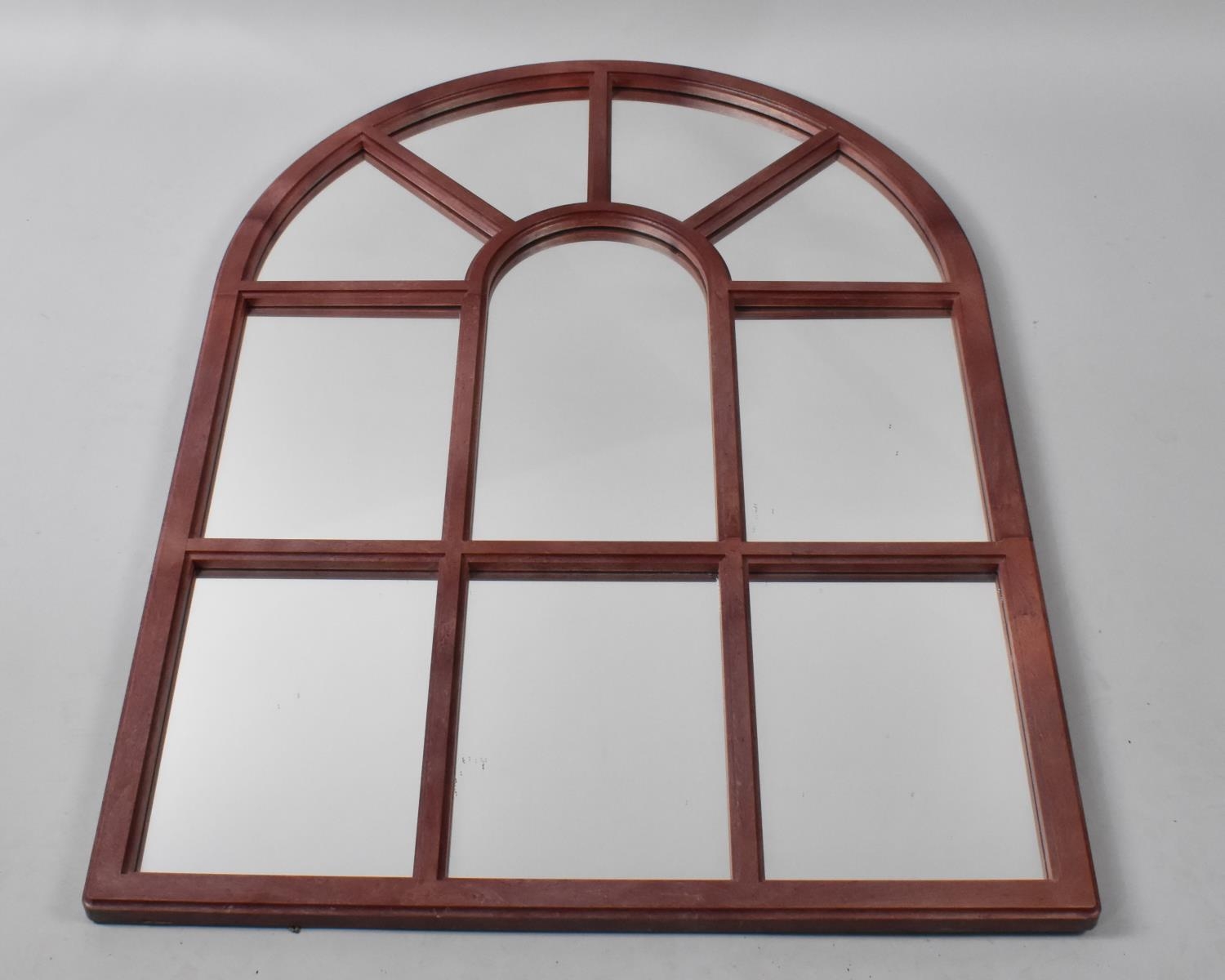 An Arched Panelled Mirror, 73cms Wide