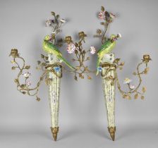 A Pair of Gilt Bronze and Porcelain Two Branch Candelabras in the Form of Parrots on Reeded Tapering