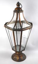 A Brushed Metal Lantern with Tapering Glass Panels on Circular Acanthus Decorated Foot, 69cms High