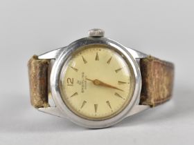 A Vintage Breitling Geneve Stainless Steel Wristwatch with Champagne Face with Gilt Baton Markers