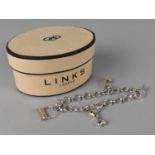 A Boxed Links of London Silver Charm Bracelet with Three Charms