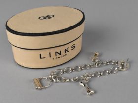 A Boxed Links of London Silver Charm Bracelet with Three Charms