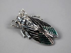 A Sterling Silver and Enamel Brooch in the Form of a Insect, 5cms Long