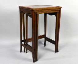 An Early 20th Century Mahogany Nest of Three Tables, the Rectangular Tops with Parquetry Banding,