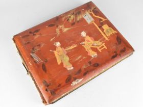 An Oriental Lacquered Photo Album Containing various Late Victorian and Edwardian Photographs,