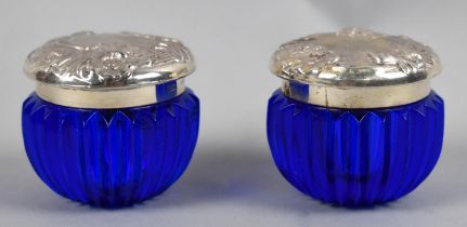 Two Blue Glass and Silver Topped Dressing Table Pots