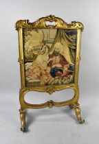 A 19th Century Gilt Framed Rococo Style Fire Screen with Ornate Gesso Scroll and Leaf Decoration,