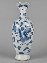 A Chinese Reproduction Blue and White Porcelain Vase Decorated with Dragons Amongst Clouds and