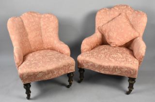 A Near Pair of Edwardian Upholstered Salon Chairs with Shaped Scalloped Back, on Turned Castor