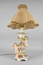 A Continental Porcelain Lamp Base, Cherubs, Condition Issues