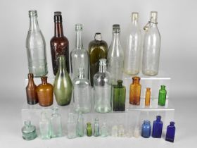 A Collection of Various Glass Bottles Etc