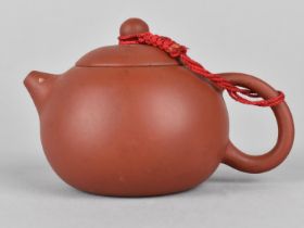 A Small Chinese Yixing Teapot with Seal Mark to Base, 9cms Wide by 5.5cms High